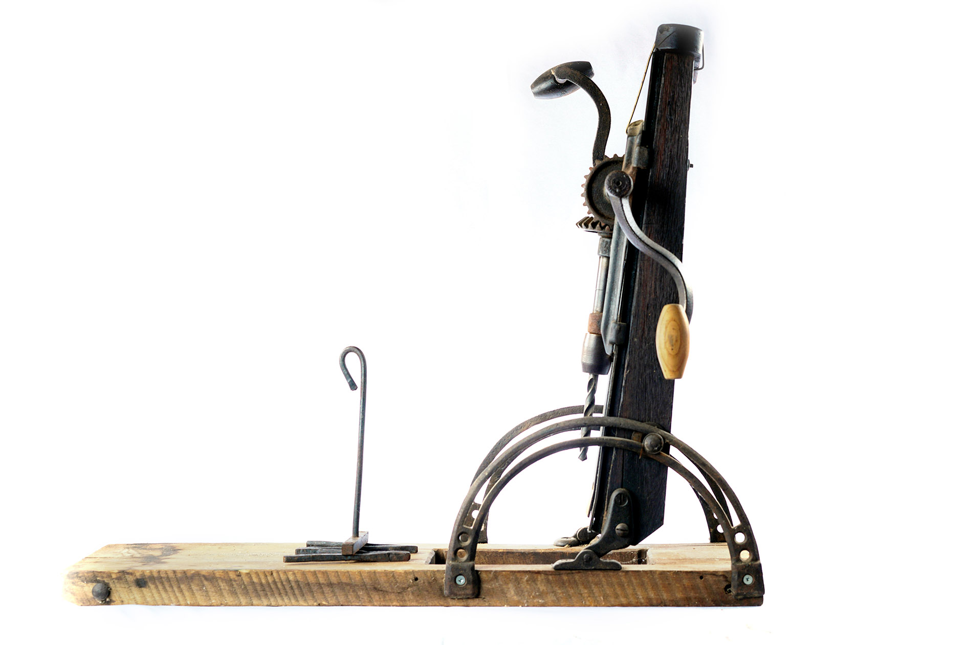 Carpenter’s boring machine and branding iron.